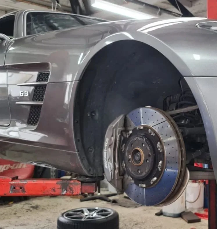 Brake disc and wheel assembly inspected during a roadworthy check