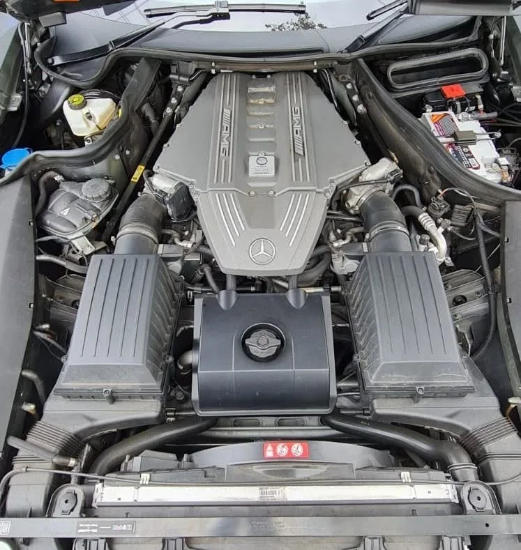Engine bay of a prestige vehicle being serviced